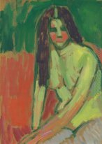 Half-nude figure with long hair sitting bent