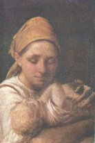 A mulher do camponês com uma criança