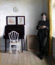 Interieur met Young Man Reading