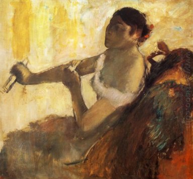 mujer sentada tirando el guante 1890