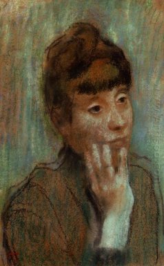 portrait d\'une femme portant une blouse verte