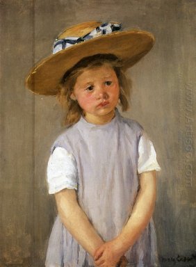 Bambino in un cappello di paglia