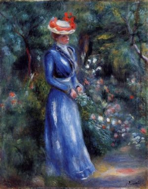 Kvinna i en blå klänning stående i trädgården av Saint Cloud 189