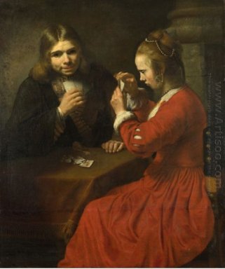 A Young Man And A Girl Playing Cards