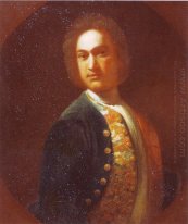 Portrait of young man in a green coat