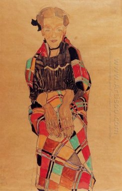 fille en tablier noir enveloppé dans une couverture plaid 1910