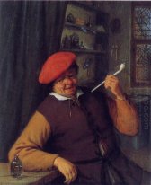 Um camponês em uma boina vermelha que fuma uma tubulação