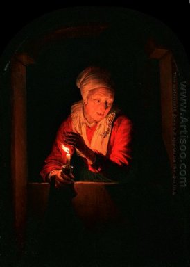 Mujer de edad avanzada con una vela