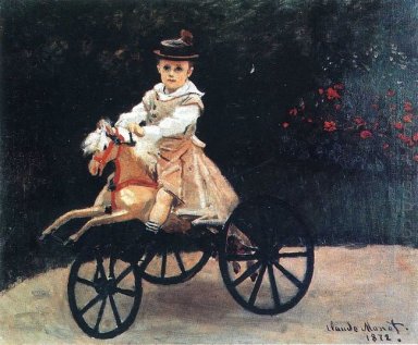 Jean Monet su un cavallo meccanico