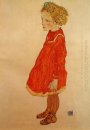 Bambina con i capelli biondi in un vestito rosso 1916
