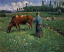 chica tendiendo una vaca en el pasto 1874