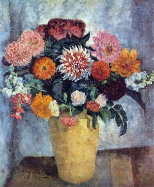 Motley Blumenstrauß in einer Ton-Glas