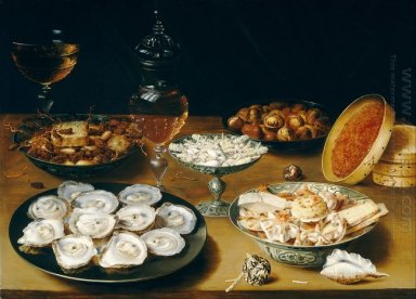 Pratos com ostras, frutas e vinho
