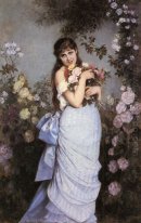 Una giovane donna in un giardino di rose