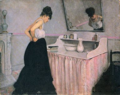 Kvinna vid ett toalettbord