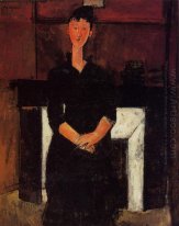 kvinna sitter med en eldstad 1915