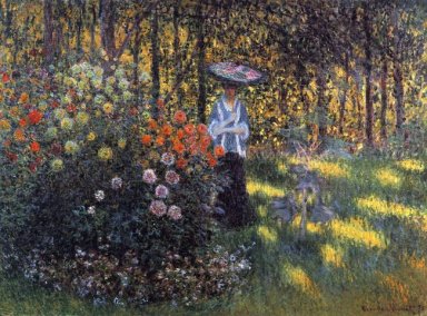 Kvinna med en ett slags solskydd i trädgården Argenteuil