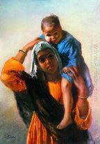 Mulher do Oriente com uma criança