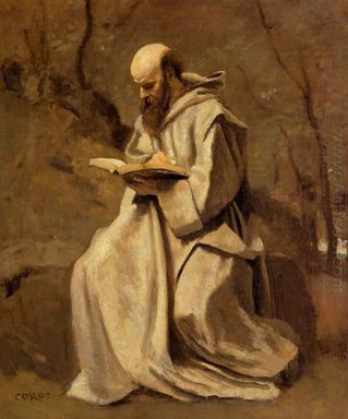 Monk en blanc en lisant assis
