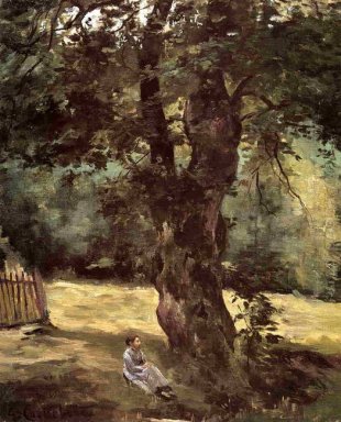 Femme assise sous un arbre