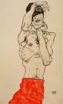 de pé nu masculino com uma tanga vermelha 1914
