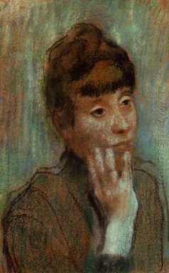 porträtt av en kvinna som bär en grön blus