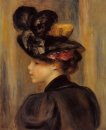 Ung kvinna som bär en svart hatt 1895