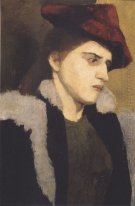 Portrait d'une jeune femme avec chapeau rouge