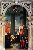 Madonna con los santos y miembros de la familia de Pesaro 1519-1