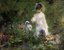 молодая женщина среди цветов 1879