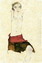 semi naken med färgad kjol och lyfta armar 1911