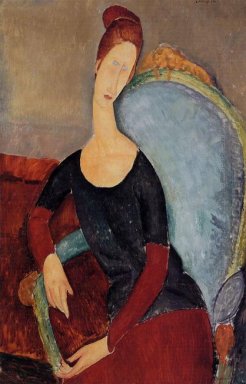 porträtt av jeanne Hebuterne i en blå stol 1918
