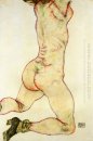 Inginocchiato nudo femminile vista posteriore 1915
