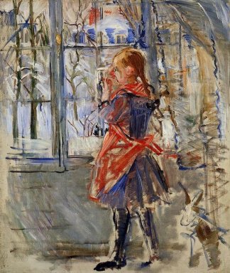 Bambino con un grembiule rosso
