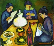 tres mujeres a la mesa junto a la lámpara