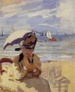 Camille sentada na praia em Trouville 1871