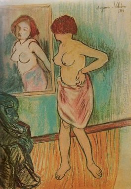 Kvinna tittar på sig själv i spegeln 1920