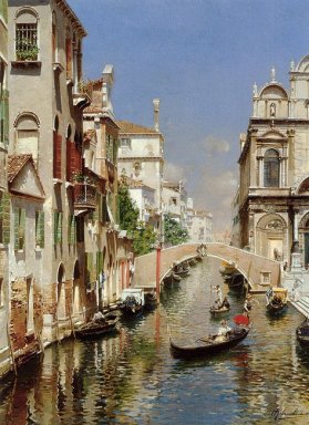 En venetiansk kanal med Scuola Grande di San Marco och Campo S