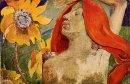 redheaded woman and sunflowers